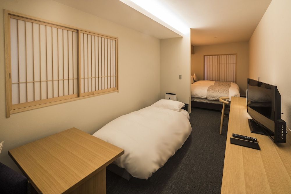 Tomoya Residence Hotel Kyoto Nijo Takakura Deluxe Twin Room with Living Area 2