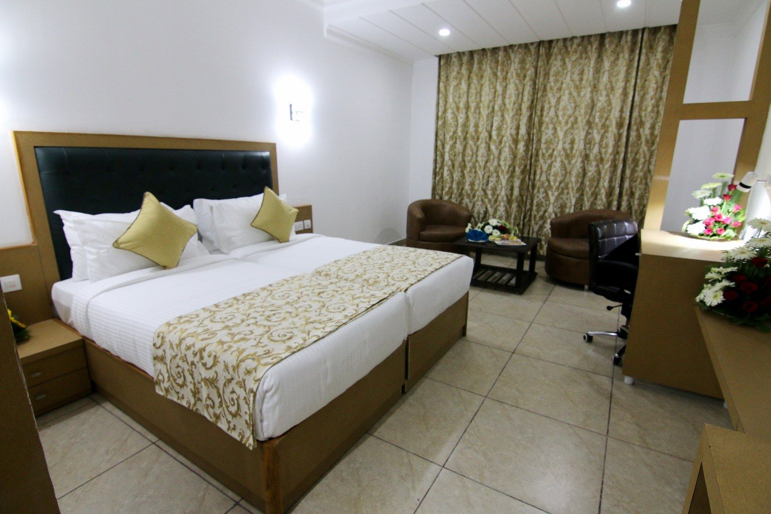 Treebo Trinetar International Deluxe Rooms 2