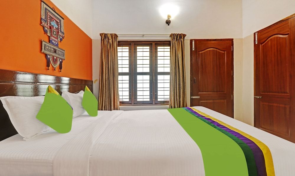 Treebo Trend Green Palm Resorts Standard Double Room 4
