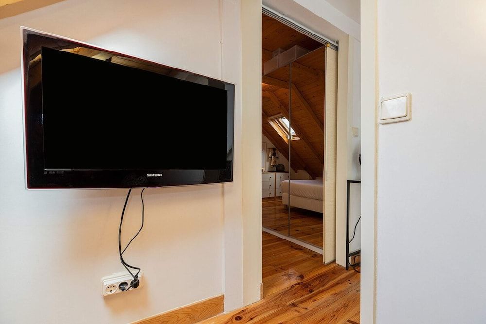 Attic Apartment With Balcony in Bairro Alto room 4