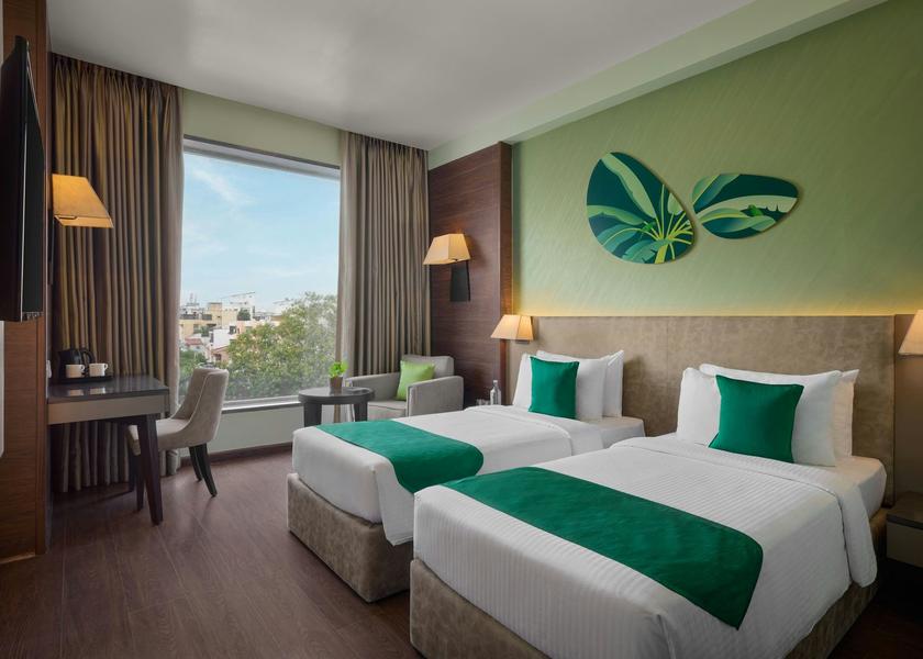 Gujarat Vadodara Guestroom - Twin Beds - TV - Desk