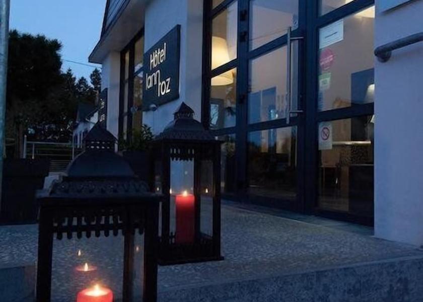 Brittany Carnac Front of property - evening/night