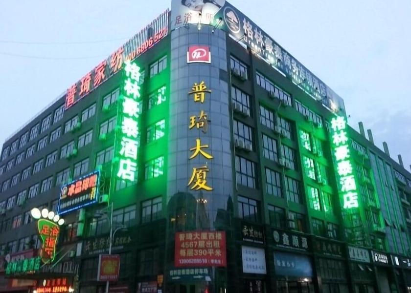 Jiangsu Nantong Front of property - evening/night