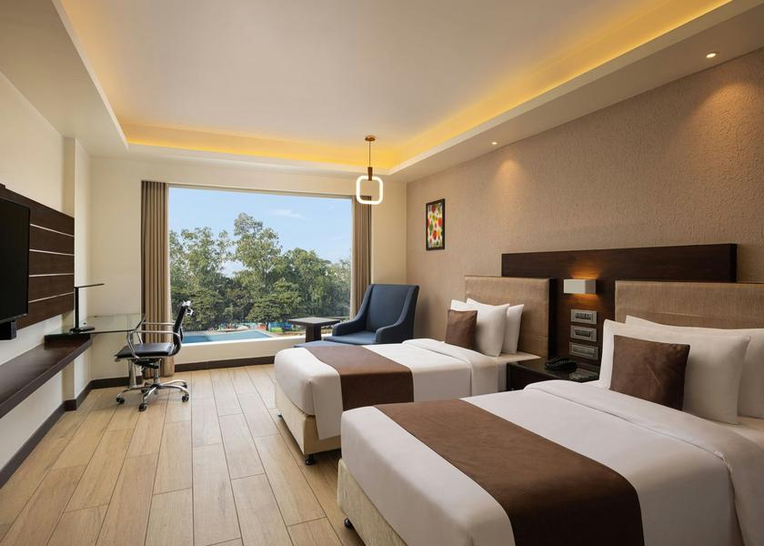 Madhya Pradesh Bhopal Guestroom - Twin Beds - Chair - Desk - Pool View