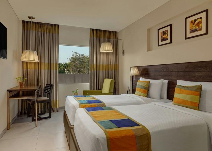 Gujarat Vadodara Guestroom - Twin Beds - Desk - TV