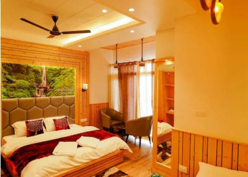 Himachal Pradesh Dharamshala Deluxe Comfort double bedroom wooden interior Market-View private balcony