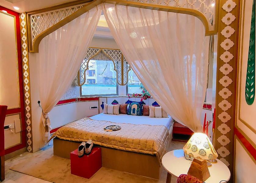 Rajasthan Jaipur Mughal heritage room with 180 degree city view from Designer bed