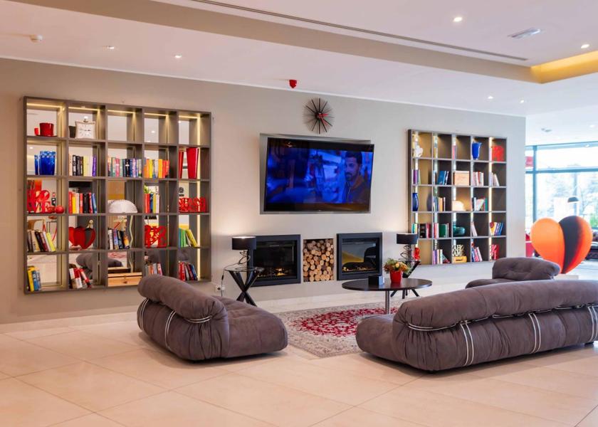 Lombardy Settala shared lounge/tv area