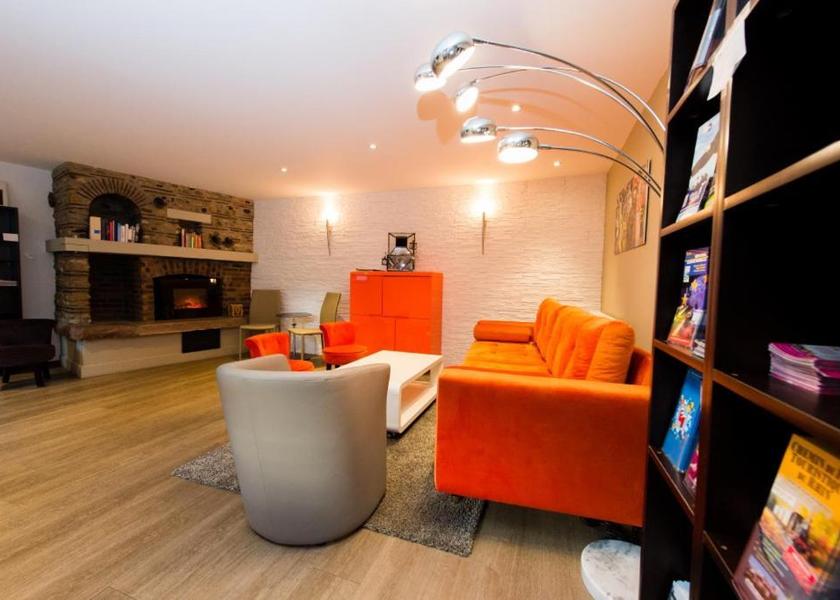 Grand Est Ribeauvillé shared lounge/tv area