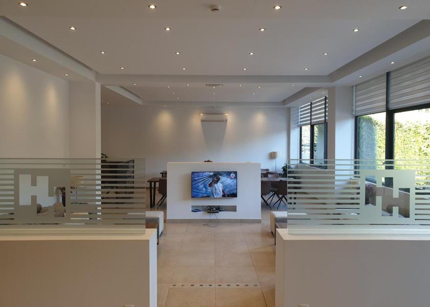 Attica Agia Paraskevi shared lounge/tv area