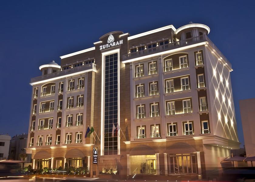  Doha Front of property - evening/night