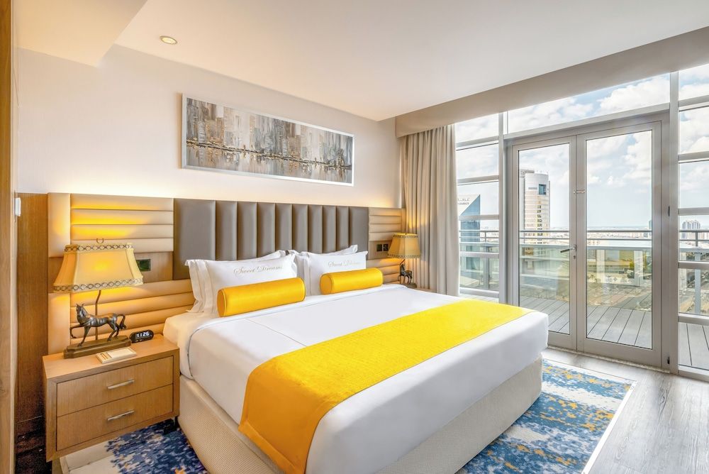 Golden Grand Suite Waterfront with Terrace, with Hermes Amenities & Jacuzzi