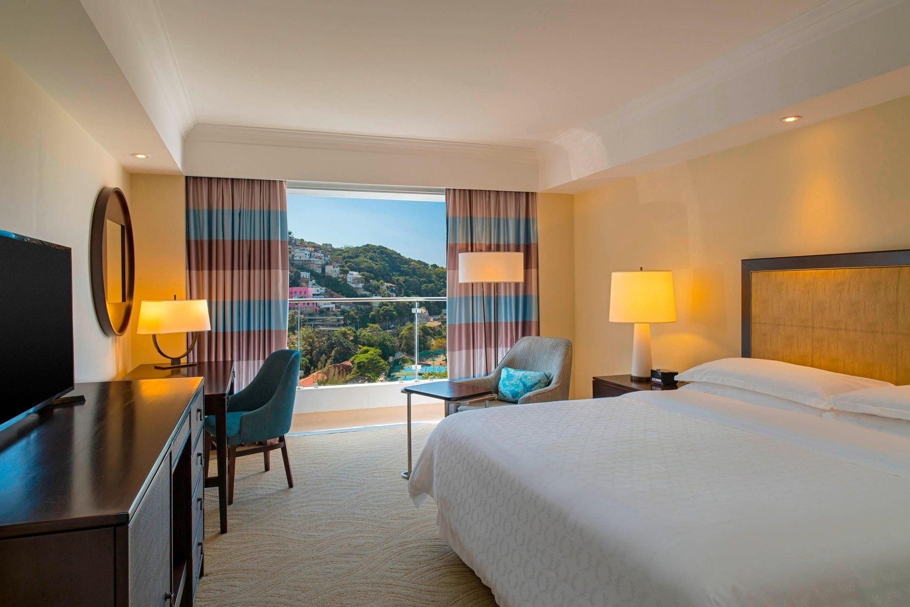 Guest room, 1 King, Partial ocean view, Balcony