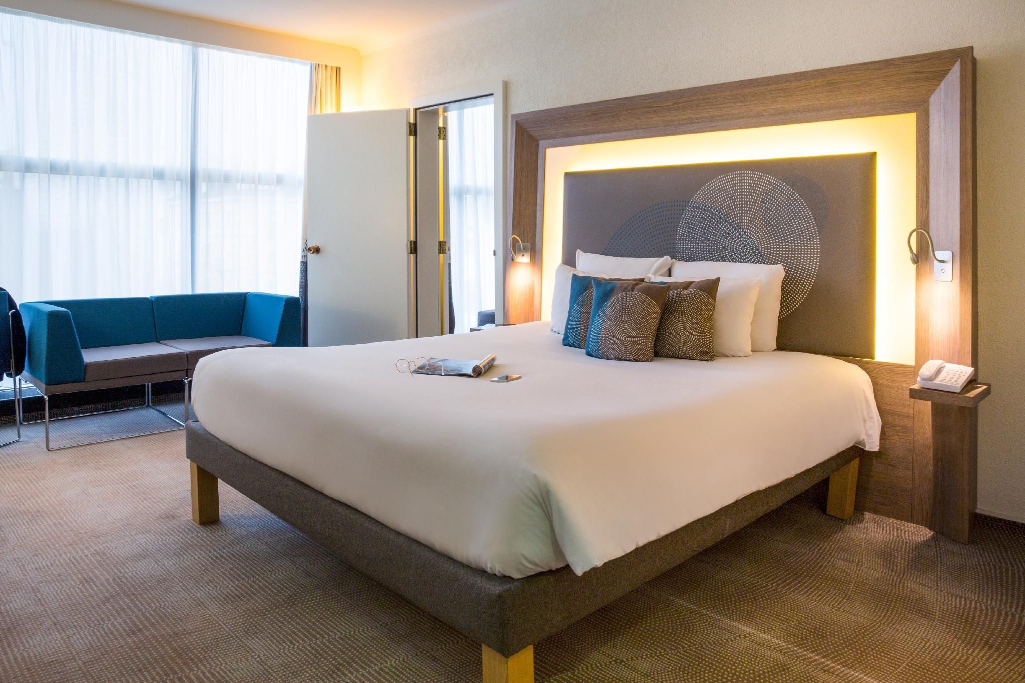 Superior Suite with a double bed and sofa bed. For up to 2 adults and 2 children