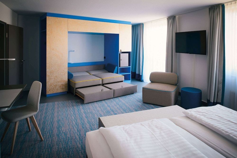 Vienna House Easy by Wyndham Günzburg Family Room 3