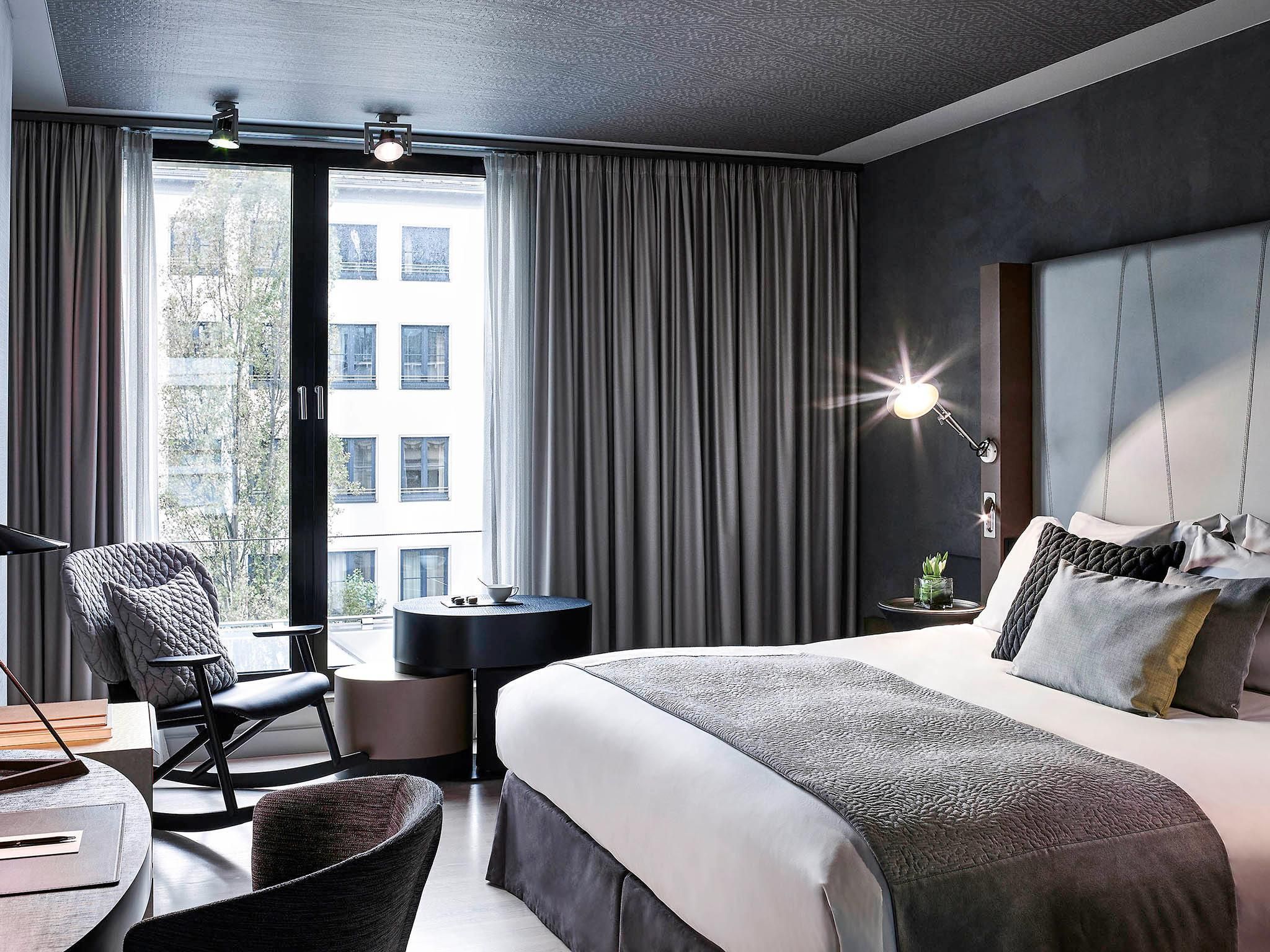 Sofitel Munich Bayerpost Superior Room: 2 Single Beds or 1 Kingsize Bed Relax with Literature