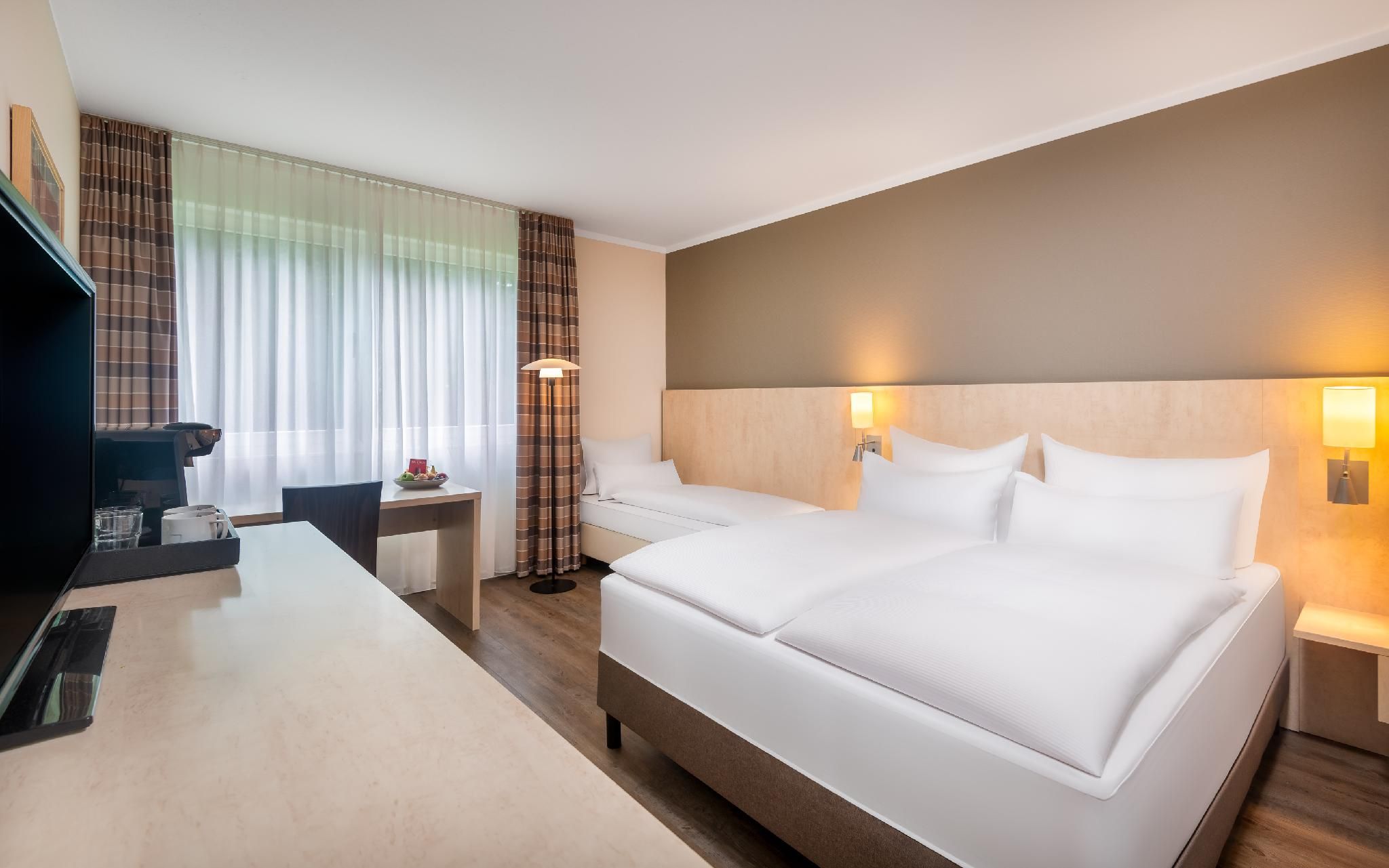 Standard Double Room and sofa