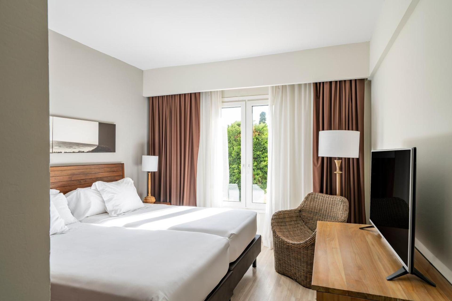 Junior Suite with Garden Access (2 Adults + 2 Children)
