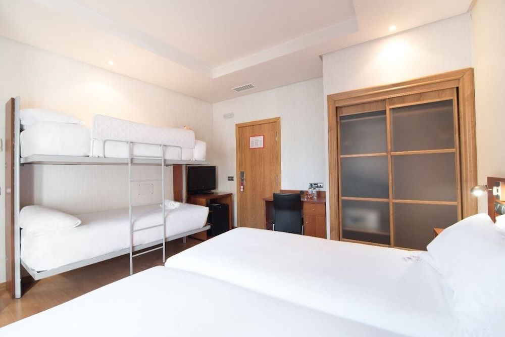 Petit Palace Preciados Quadruple Room