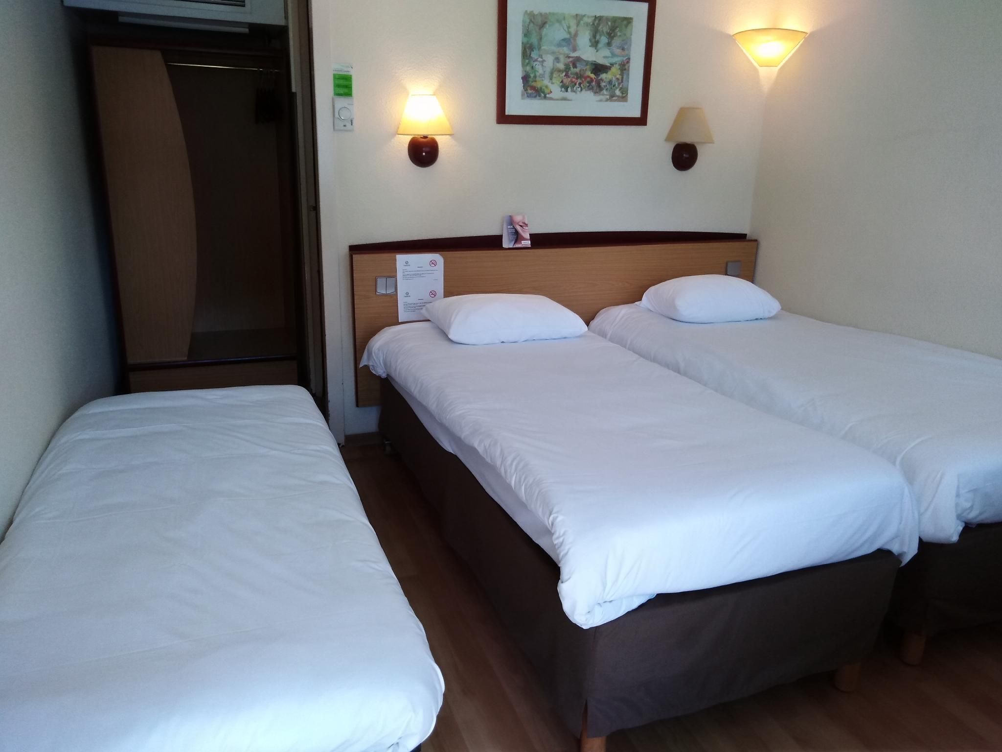 Triple - 2 Single Beds + 1 Extra Bed