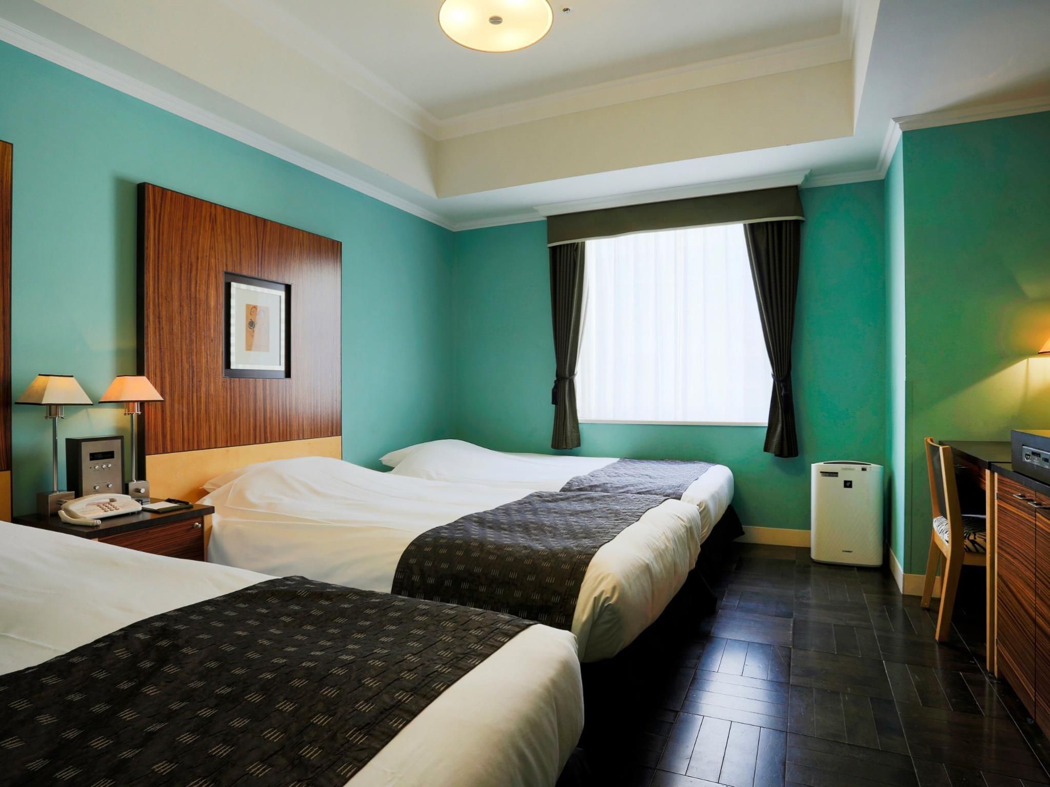 Triple Room with 2 Single Beds and 1 Extra Bed - Non-Smoking