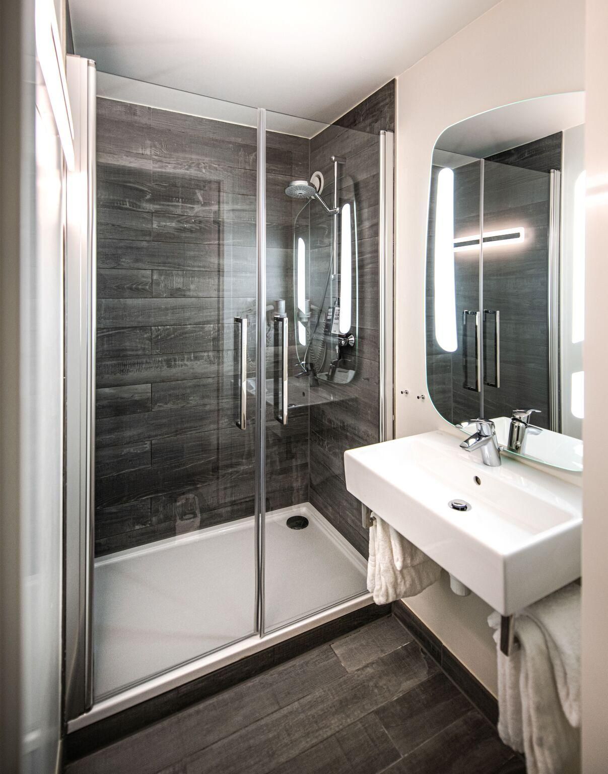 Family room with bunk beds and a view of the tr ains