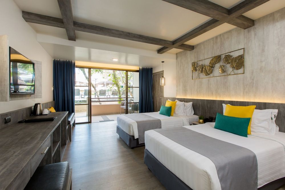 Coconut Village Resort Grand Deluxe Pool View 4