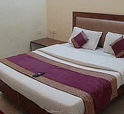 Hotel Abhinandan Grand Deluxe Room Non A/C 4