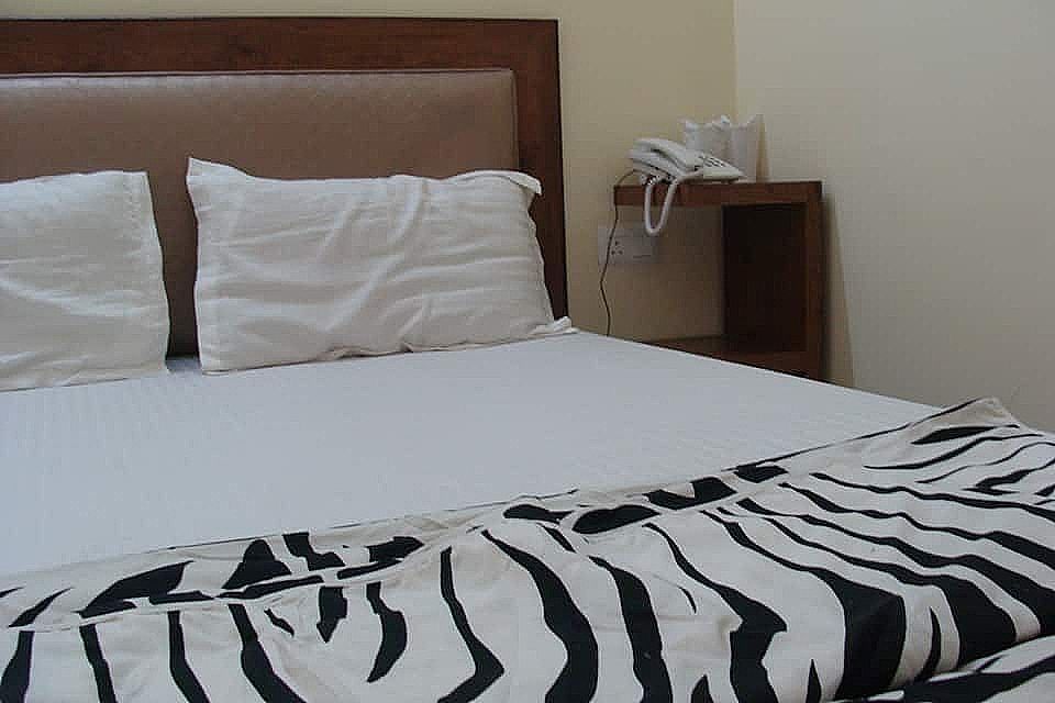 Hotel Abhinandan Grand Deluxe Room Non A/C