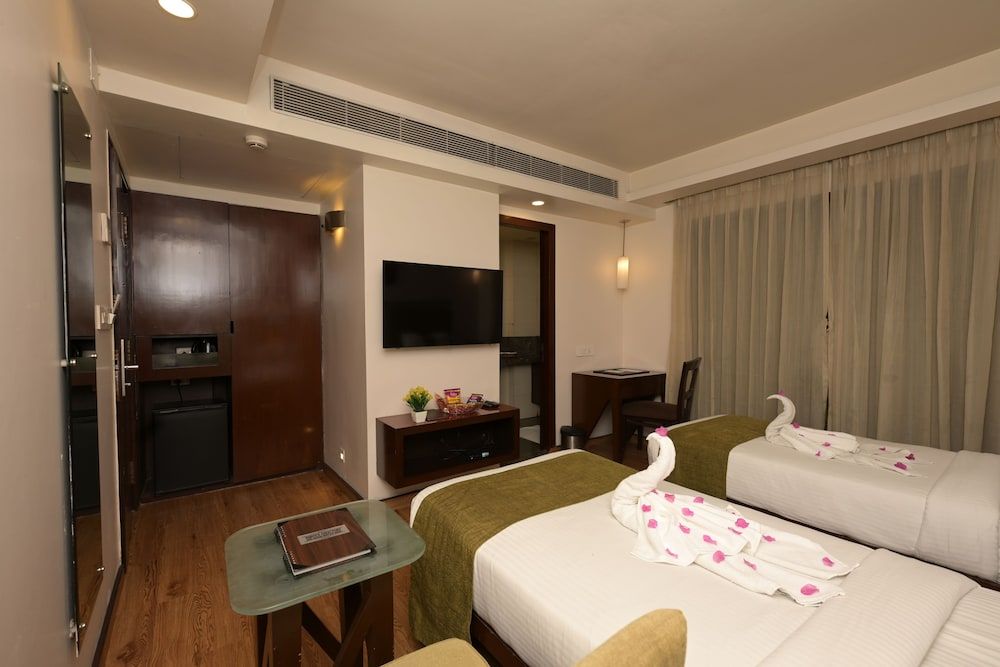 Visitel - A Boutique Hotel Kolkata Premium King Room 4
