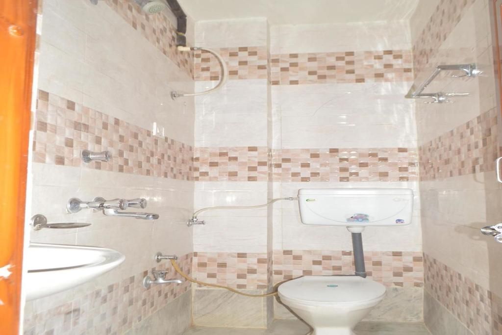 Ajanta Hotel Deluxe Three Bed AC Room 5