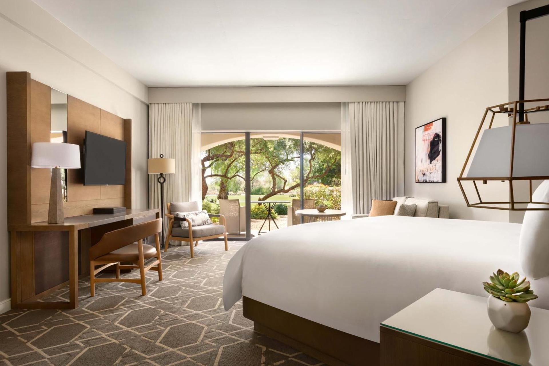 Deluxe View 1 King-  Patio or balcony , premium pool views, oversized shower