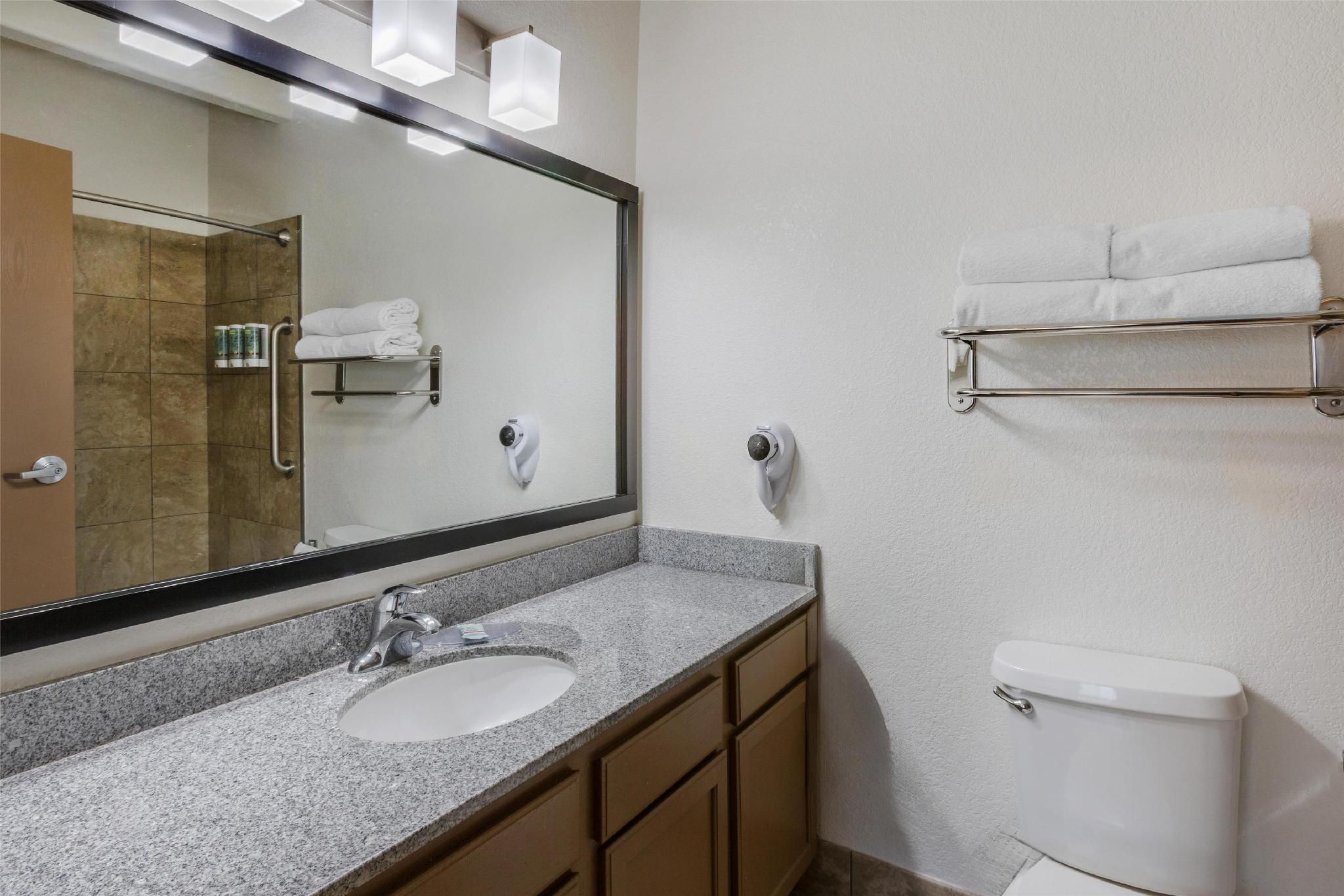 Suite - 1 King 2 Queen Beds, Non-Smoking, Two Rooms, Three Televisions, Microwave And Refrigerator,