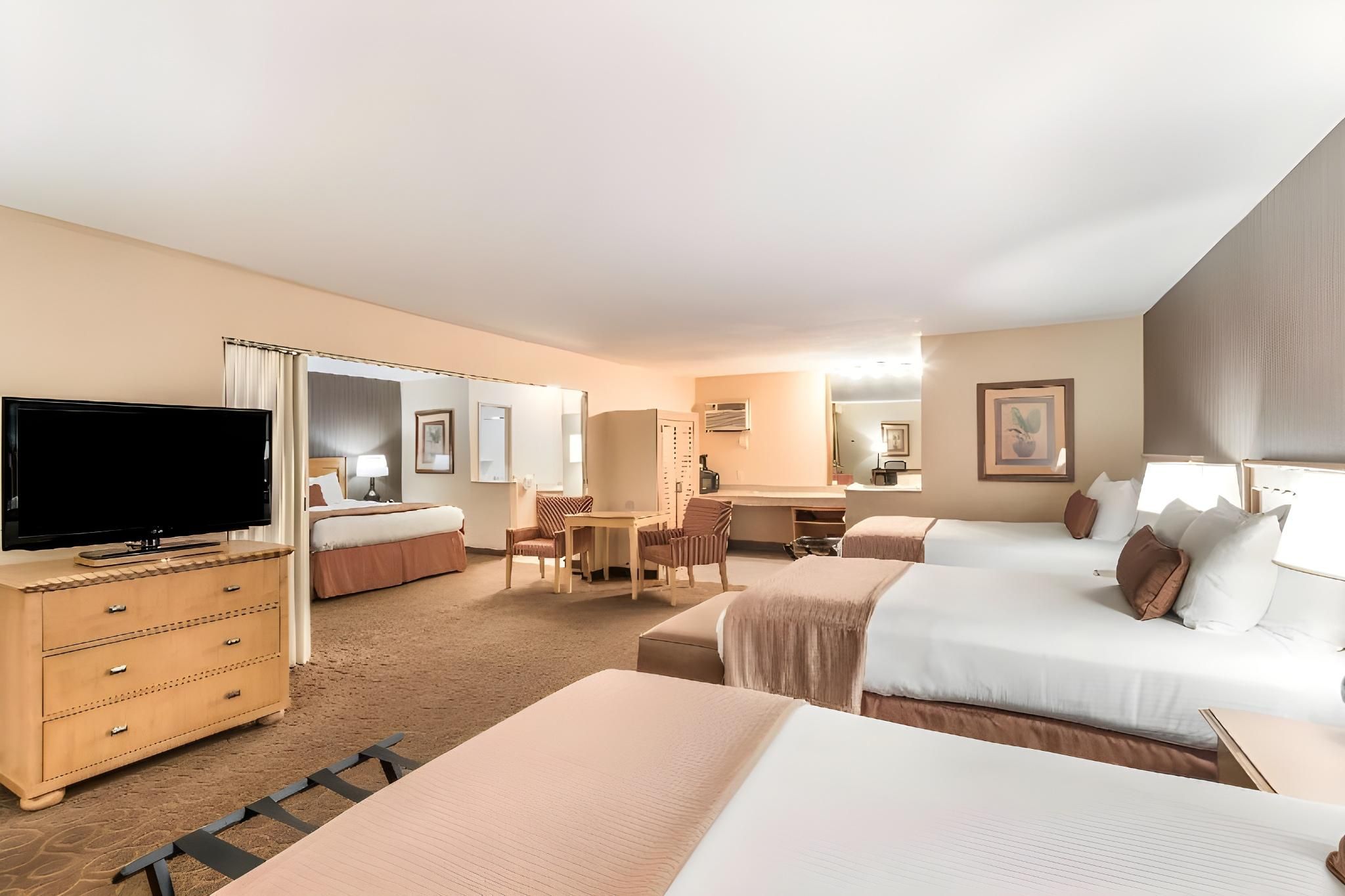 Suite-1 King Bed, Nonsmoking, Three Double Beds, 2 Bathrooms