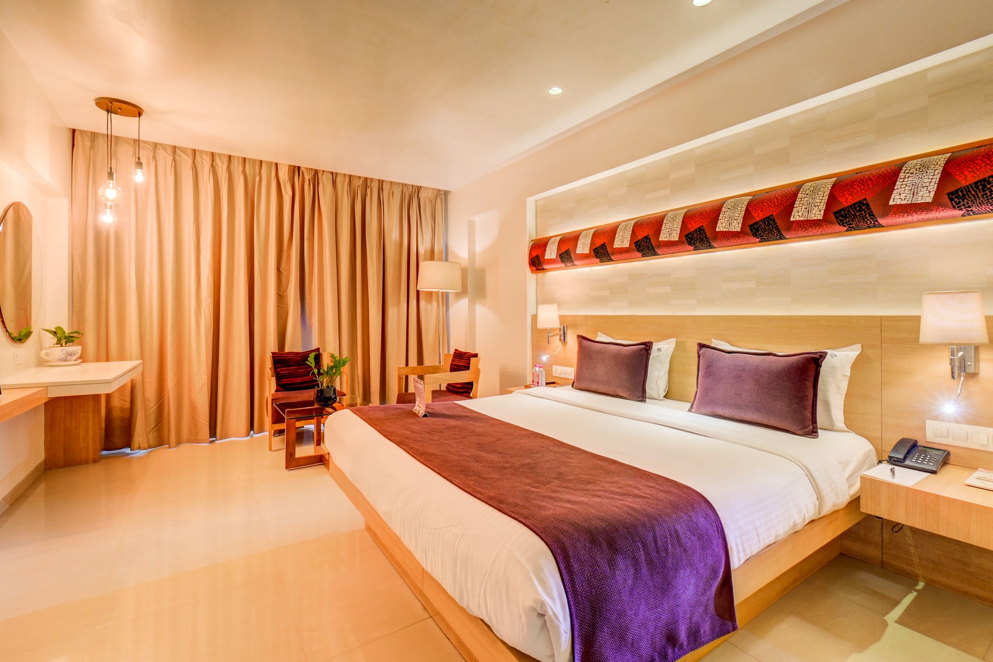 The SSK Solitaire Hotel and Banquets Premium Room 6