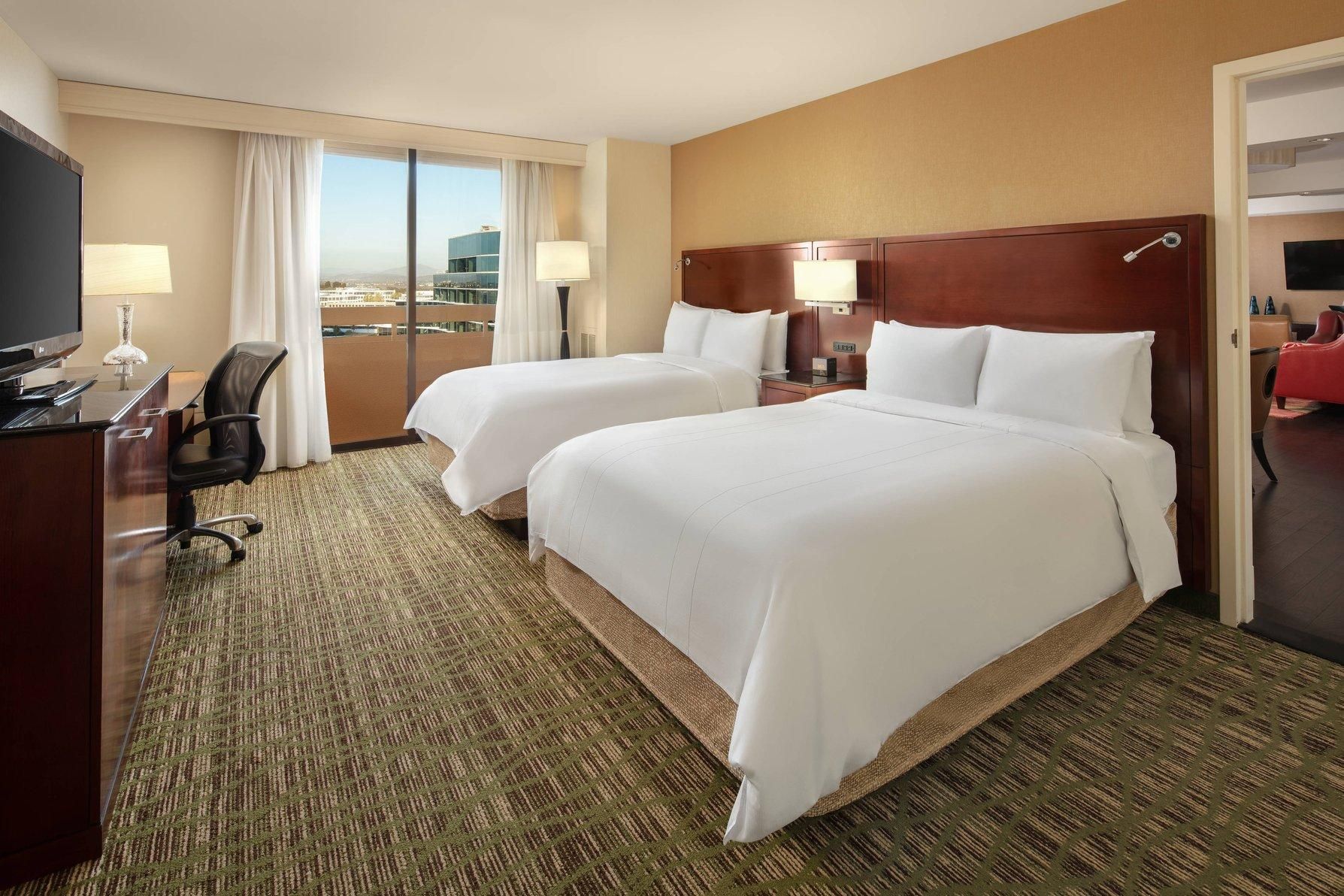 Presidential Suite, Bedroom 1: 1 King, Bedroom 2: 2 Double, Sofa bed, Balcony
