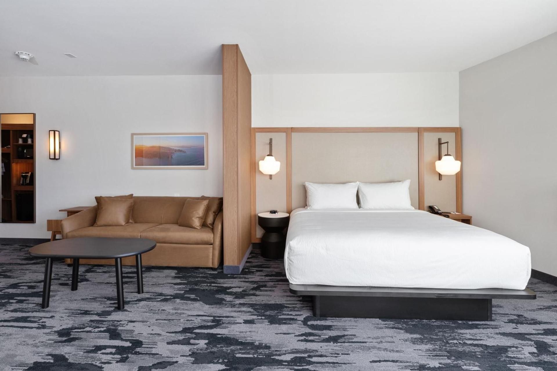King Suite with Sofa Bed and Partial Ocean View