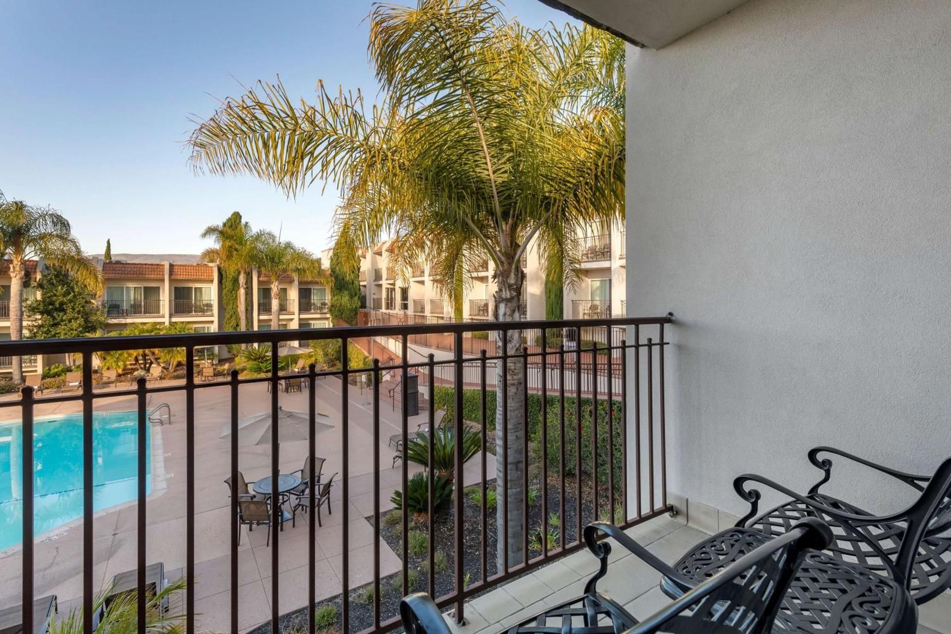 2 Queen Beds, Non-Smoking, Balcony, Pool View, High Speed Internet Access, Refrigerator, Coffee Make