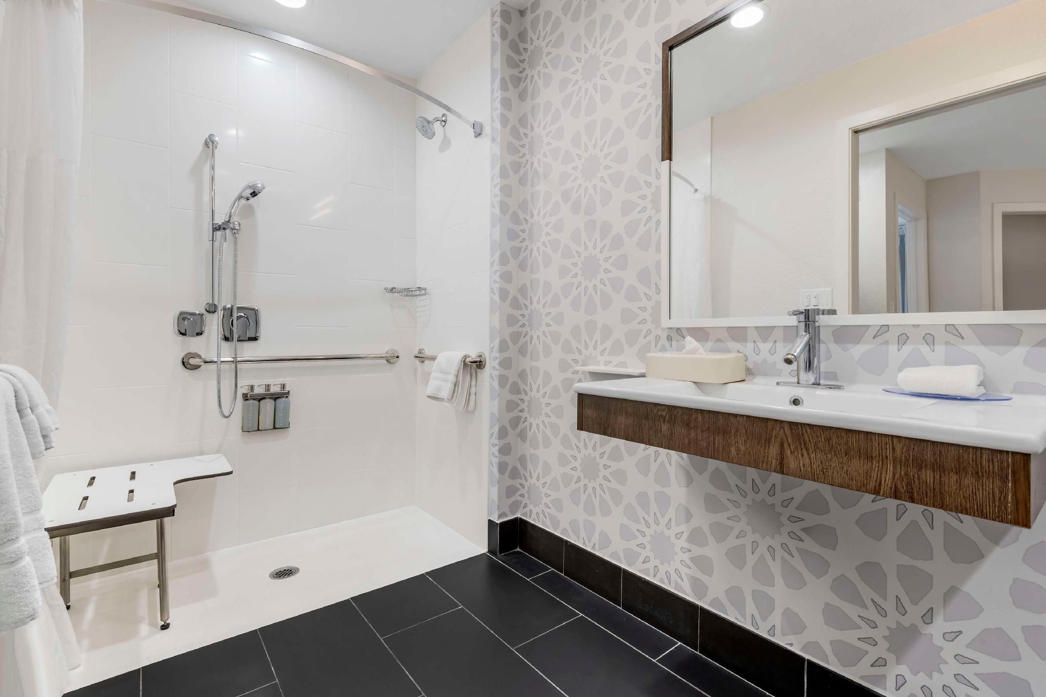 Mobility Accessible One Bedroom Suite Queen Roll-In Shower