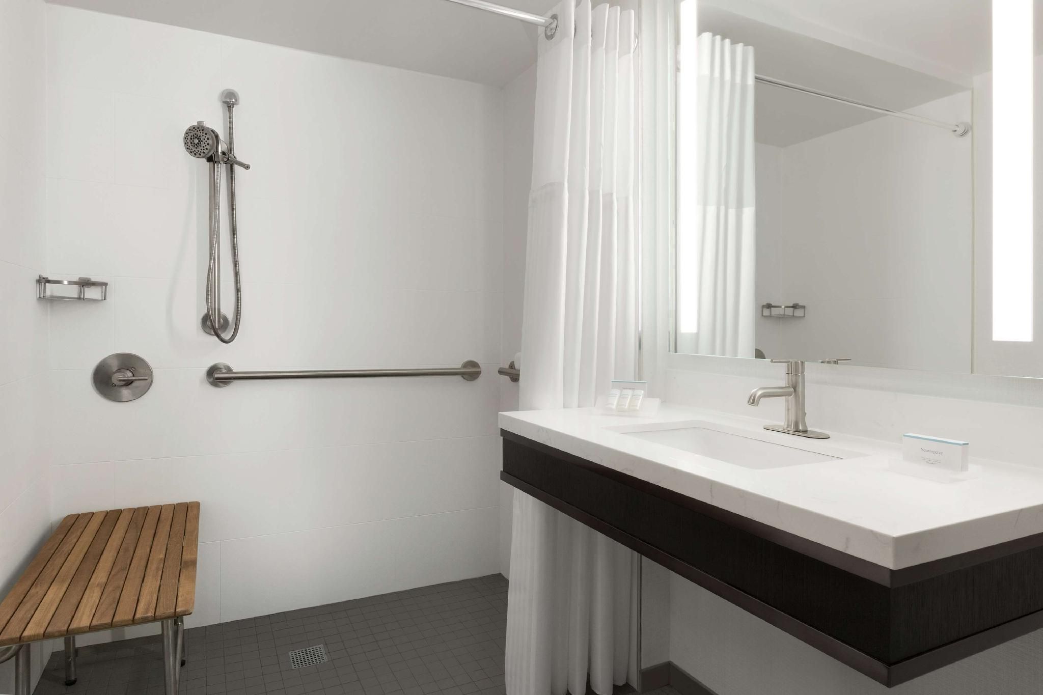 1 KING MOBILITY ACCESSIBLE W/ROLL IN SHOWER