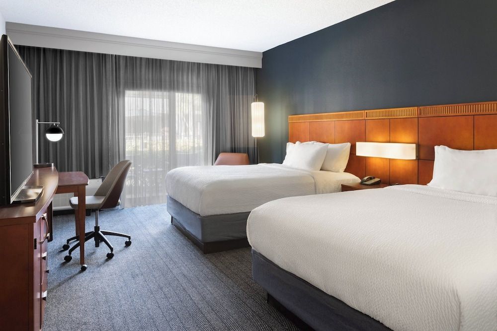 Suite, 2 Double Beds, Courtyard View (Hearing Accessible)