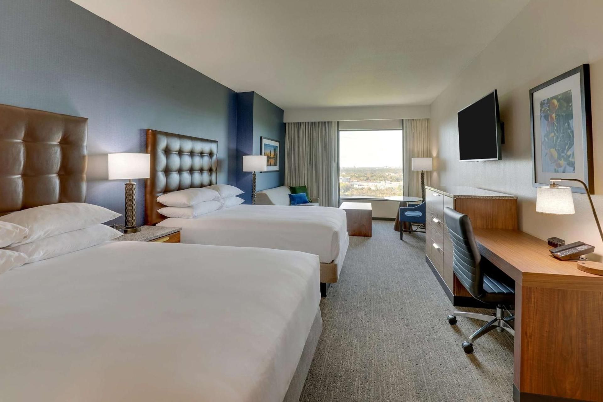 Deluxe Queen Room with Two Queen Beds and Sofa Bed
