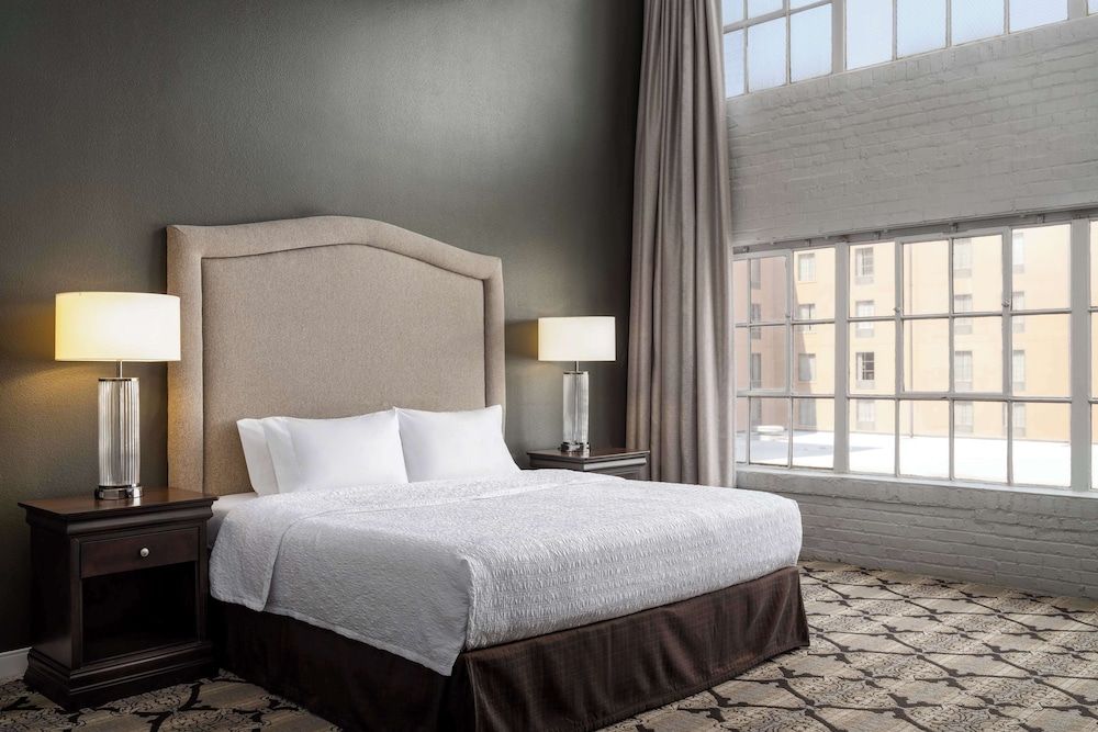 Suite, king bed, sofa bed, kitchen, accessible shower