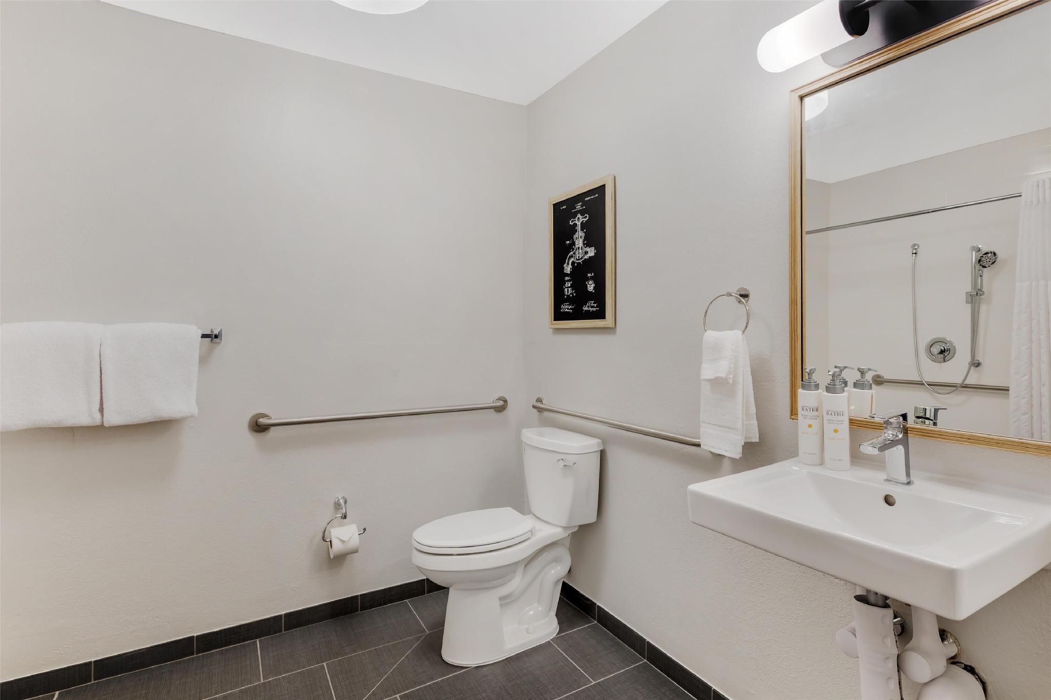 Mobility Accessible One Bedroom Suite Queen Roll-In Shower