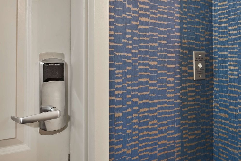 2 Queen Mobility/Hearing Accessible Roll-Inn Shower