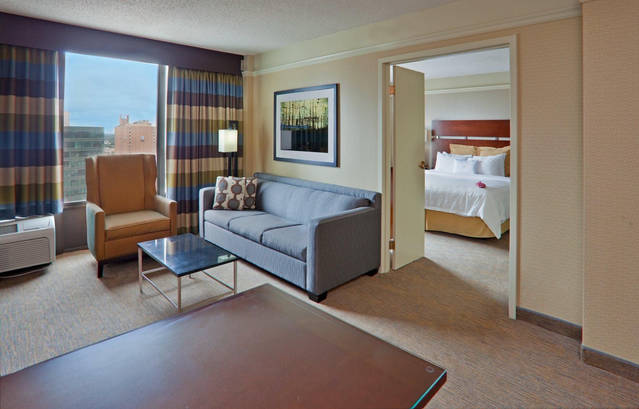 1 King 1 Bedroom Suite Mobility Accessible Roll Shower