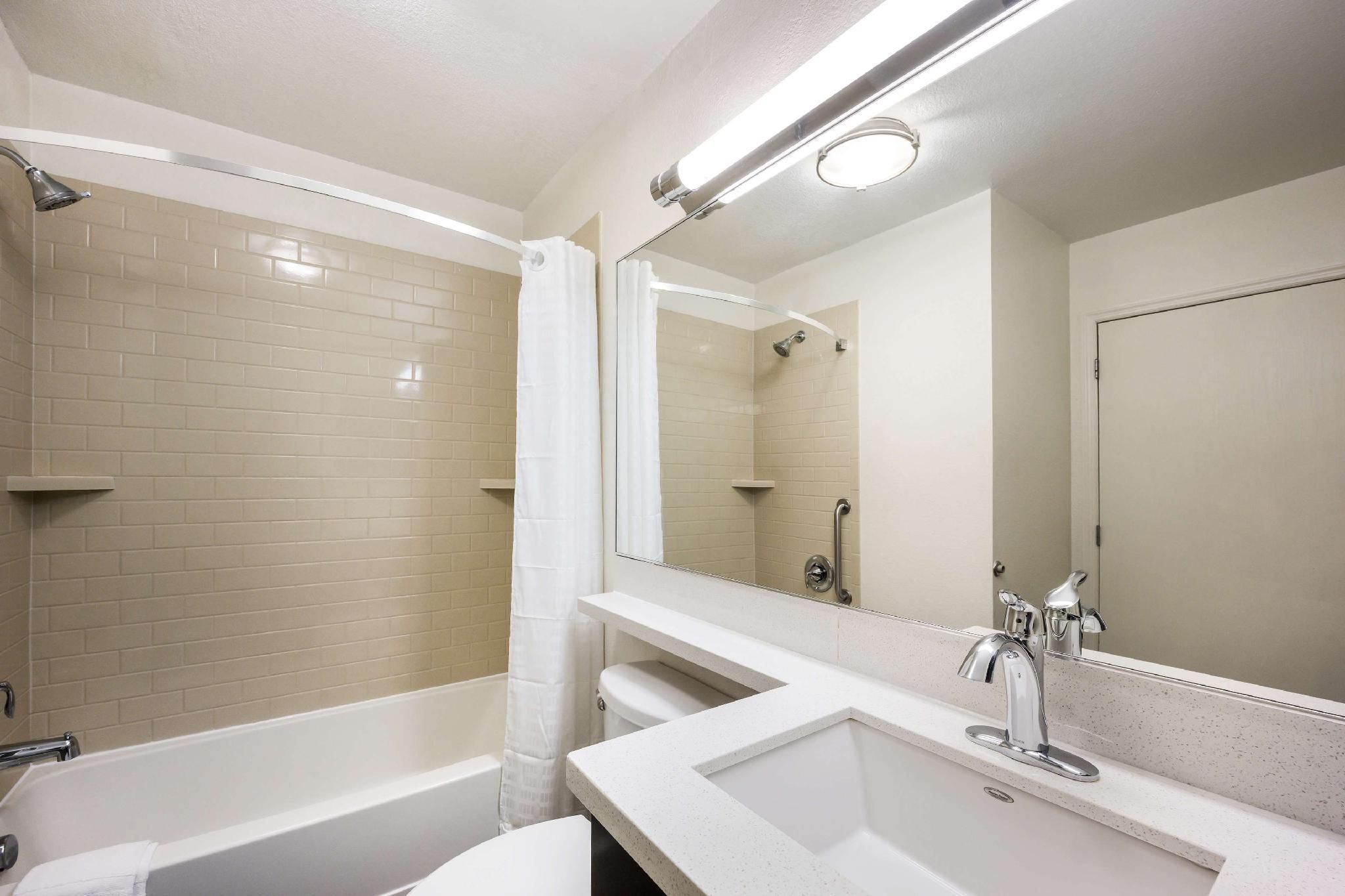 Mobility Accessible One Bedroom Suite Queen Roll-In Shower