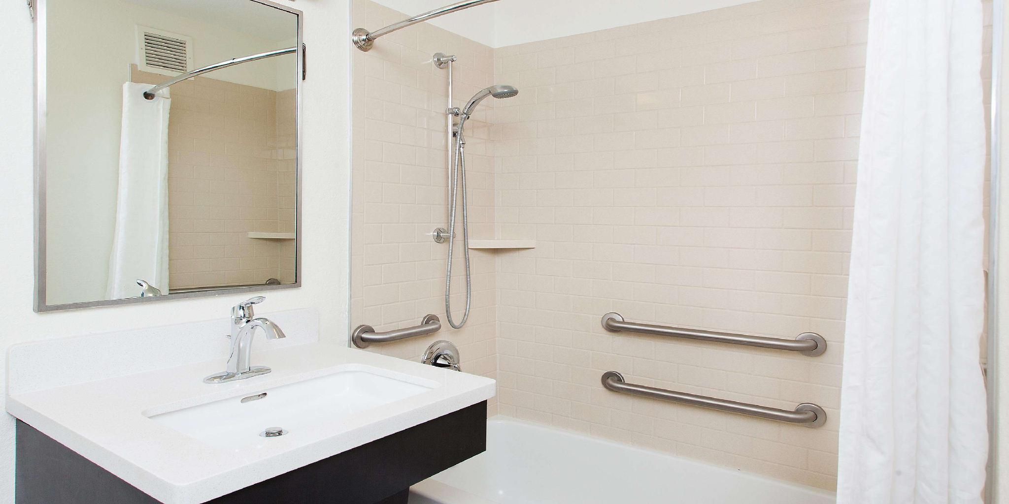 Mobility Accessible One Bedroom Suite Queen Roll-In Shower