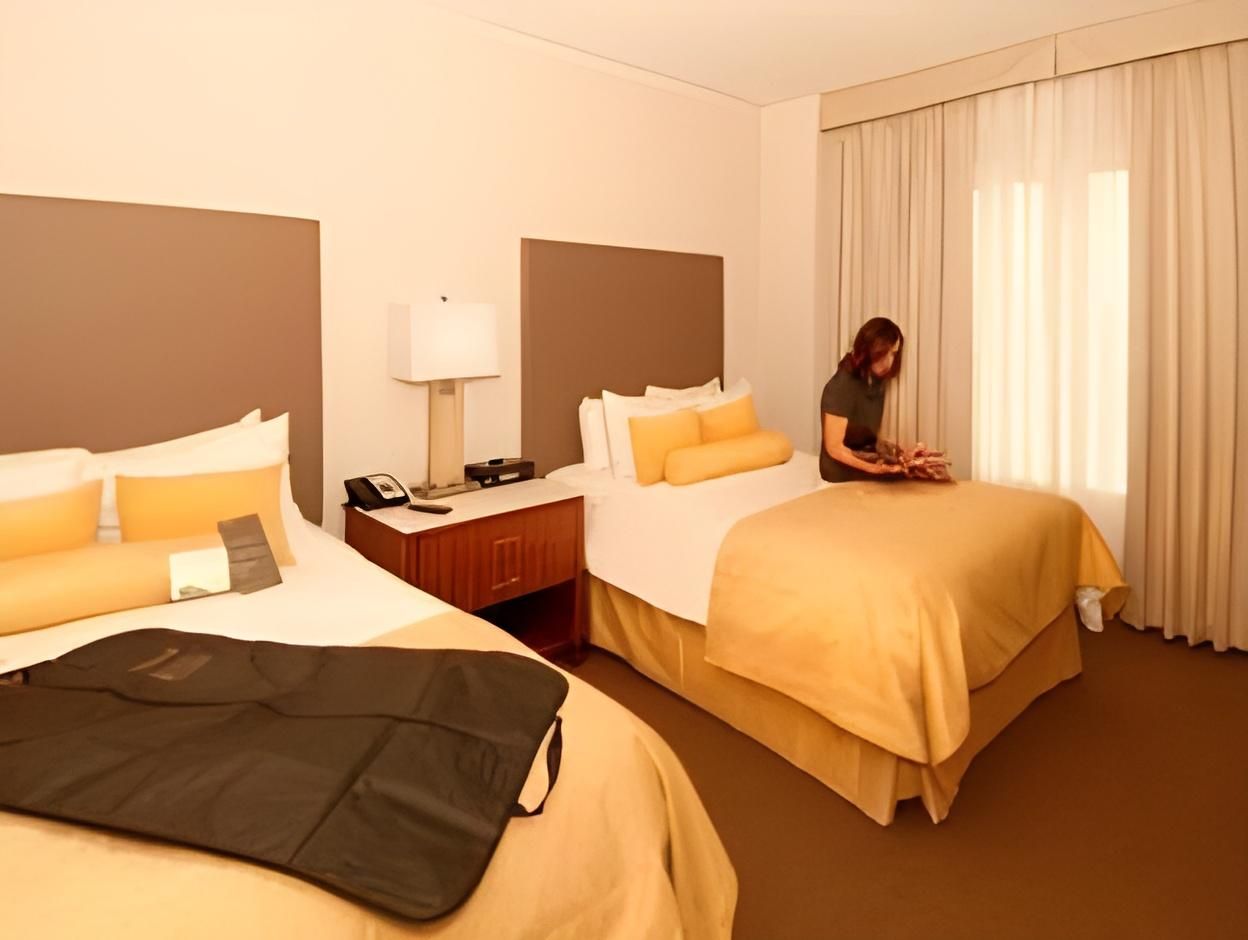 2 Double Beds 1 Bedroom Suite Club Floor