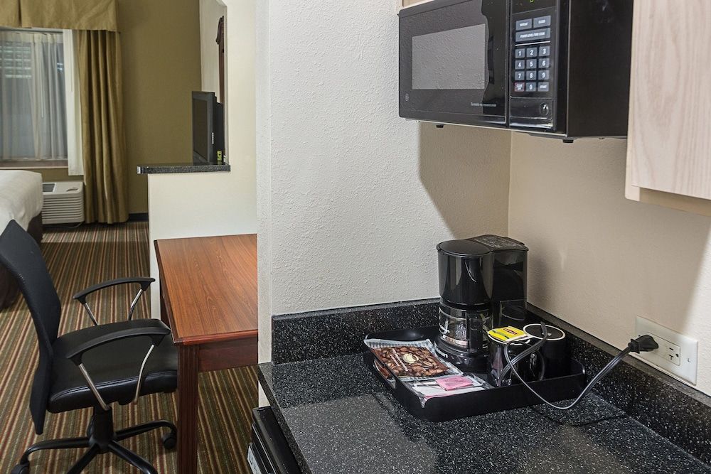 Quality Inn & Suites West Chase Standard Room, 1 King Bed with Sofa bed, Non Smoking 5